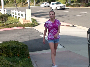 A slender female plays with her pink cootchie in a public park