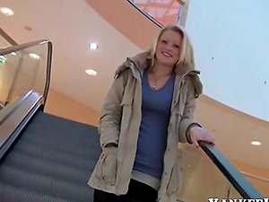 German blonde is doing a blowjob in a shopping centre